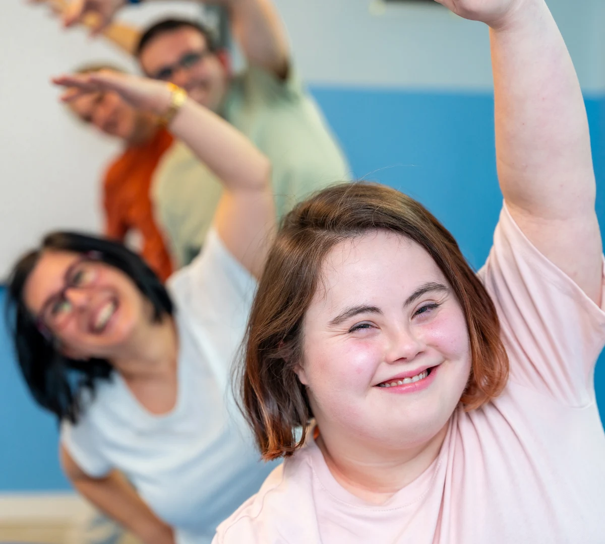 Disabled woman in yoga class