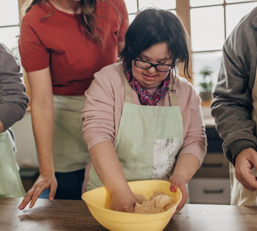 Disabled girl baking